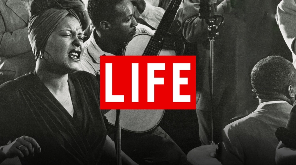 LIFE logo over a black and white jazz performance.
