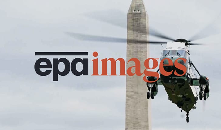 EPA logo over a helicopter flying by the Washington Monument.